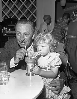 2 3 Years Prints: Walt Disney Sharing Ice Cream Soda with Little Girl