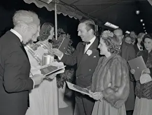 Walt Disney and Wife Arriving at Movie Premiere