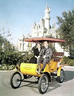 Walt Disney and Wife Riding in Antique Auto at Disneyland