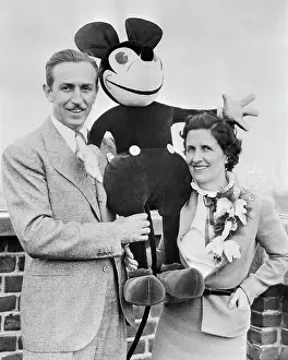 Honeymoon Prints: Walt and Mrs. Disney Standing with Stuffed Mickey Mouse