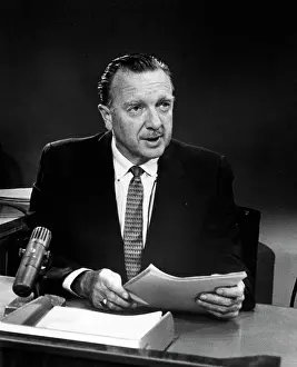 Newscaster Prints: Walter Cronkite Seated At Desk