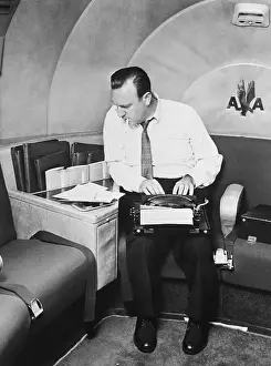 Typing Prints: Walter Cronkite Working at Typewriter