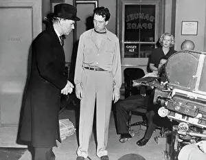 Walter and John Huston on Maltese Falcon Set