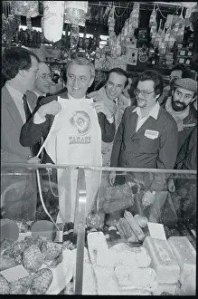 Walter Mondale Displaying Apron
