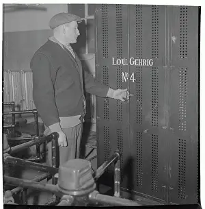 Walter Owens Standing at Locker Belonging to Lou Gehrig