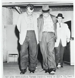 Memphis Prints: Most Wanted Suspects Being Escorted With Their Heads Down