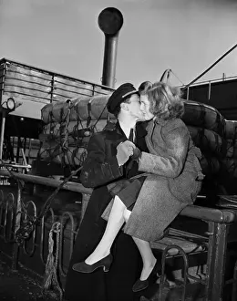 War Bride and Husband Kissing on USS Argentina