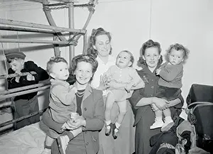 War Brides Posing with Their Children on USS Argentina