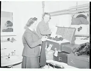 Two War Brides of USS Argentina Packing Luggage for Departure