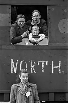 Prints of Latvian immigrant family prepares for trip to America from Germany in 1950. (Photo Augusts Upitis/Getty Images) Timeless Moments: A Visual Journey Through History’s Defining Images: War Immigrants On Train
