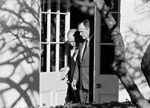 Prints of WASHINGTON DC -- FEB 12: U.S. Secretary of Defense Dick Cheney reports to President George H.W. Bush at the White House after his Mideast mission Februrary 12, 1991 in Washington, DC Cheney Uncovered: Political Portraits: War with Iraq 1991