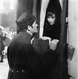 Prints of Actors Henry Fonda (1905 - 1982) and Audrey Hepburn (1929 - 1993) flming a scene for the movie War and Peace, based on the novel by Leo Tolstoy, 26th August 1955 Elegance Personified – A Classic Art Print Collection: War And Peace