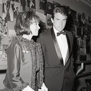 Displaying Prints: Warren Beatty and Leslie Caron at Party