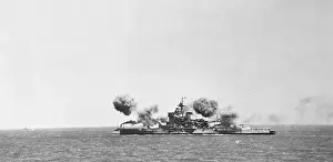 Warspite Firing Shells on the Ocean