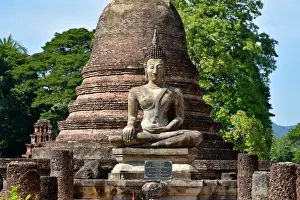 Sukhothai Prints: Wat Mahathat statue with stupa Sukhothai Thailand, Asia