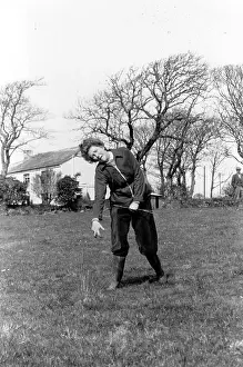 Prints of Catherine Bent, a professional water diviner, gives a demonstration of her powers whilst at work for a farmer in Cornwall A Photographic Legacy: Water Divining