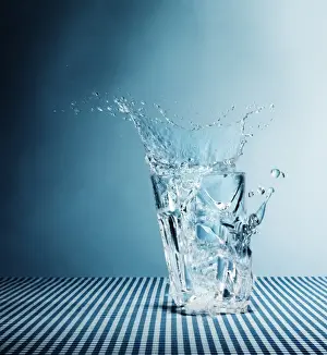 Splashing Prints: Water splashing from broken glass