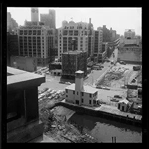 Prints of BROOKLYN, NY - MARCH 1958: The landmarked One Water Street, formerly FDNY Marine Company 7, and now the Brooklyn Ice Cream Company Portraits, Artworks, and Montages from a Visionary Photographer: On Water Street in Dumbo, Brooklyn, in the 1950's