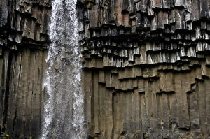 Volcano Collection: Waterfall with basalt columns in Skaftafell National Park, Iceland, Europe