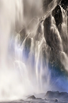 Waterfall with faint rainbow, blue spectrum, Bridal Veil Falls, Kanai Penninsula Waterfall with faint rainbow, blue spectrum, Bridal Veil Falls, Kanai Penninsula