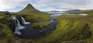 Waterfall near Grundarfjordur, Kirkjufell and Grundafjordur at the back, Snaefellsnes peninsula, Iceland