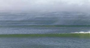 waves on green sea, morning fog, New Zealand