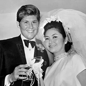Wayne Newton Posing with His Bride