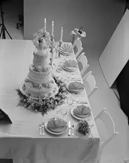 Images Dated 30th July 2011: Wedding cake decorated with place setting