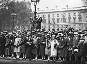Prints of 12th May 1927: Crowds of spectators line the pavements and climb the lamppost at the wedding of the MP for Warrington, Alec Cunningham Reid. (Photo by Topical Press Agency/Getty Images) Topical Press Agency Prints: Wedding Fans