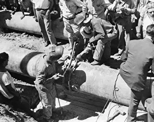 Welders Put Joint on Large Pipe