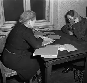 Welfare Worker Interviewing Refugee