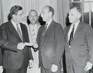 Commissioner Prints: Wendell Willkie accepting Check from David E. Lilienthal