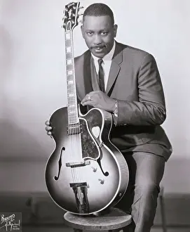 Wes Montgomery Posing with Instrument