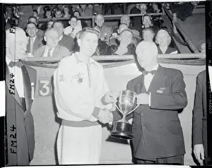 Wes Santee Receiving Trophy From Thomas F. Harrigan