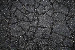 Images Dated 15th July 2012: Wet cracked asphalt