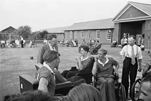 Diry 18411 Prints: Wheelchair Netball - Dr. Ludwig Guttmann with patients at Stoke Mandeville Hospital