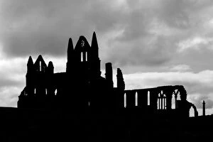 Images Dated 17th May 2018: Whitby Abbey silhouetted against a cloudy sky, North Yorkshire, England
