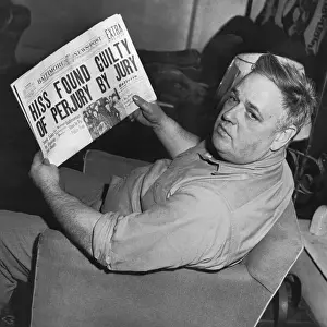 Whittaker Chambers Sitting with Newspaper