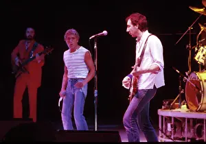 Prints of CIRCA 1984: Bass player John Entwistle, singer Roger Daltrey and guitarist Pete Townshend of the rock and roll band The Who perform onstage in circa 1984. (Photo by Michael Ochs Archives/Getty Images) The Who Prints: The Who Performing Onstage