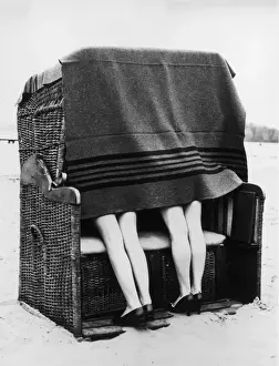 Prints of Bathers sheltering from the cold in a home-made windbreak by the Wannsee Lake in south west Berlin. (Photo by Keystone/Getty Images) The Keystone Press Agency Collection Prints: Wicker Windbreak