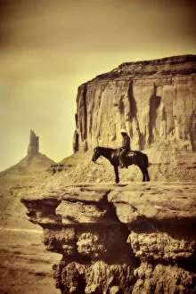 Wildwest Coyboy on Horse in Old Retro Antique Sepia Tone
