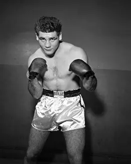 Prints of NEW YORK, NY - NOVEMBER 26: Heavyweight professional boxer Willi Besmanoff (1932-2010) of Germany poses for a portrait on November 26, 1956 at Stillman's Gym in New York, New York In the Ring: The Art of Boxing: Willi Besmanoff