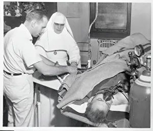 Wichita Prints: William D. Rockne Lying on Operating Table