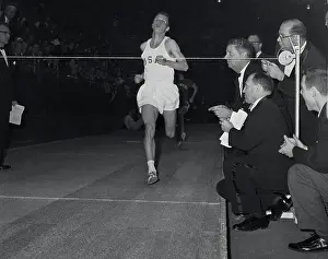 William Dellinger Running in Track and Field Event