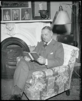 William J Prints: William Donovan Reading Book