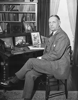 William J Prints: William Donovan Seated at Desk