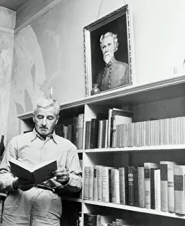 Oxford Prints: William Faulkner Reading Book in Home