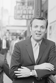 William Goldman near Theater Sign