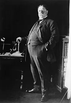 William H. Taft Standing Beside Telephone