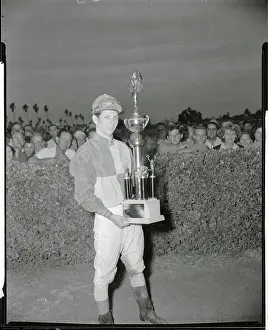 William Hartack Holding Racing Trophy